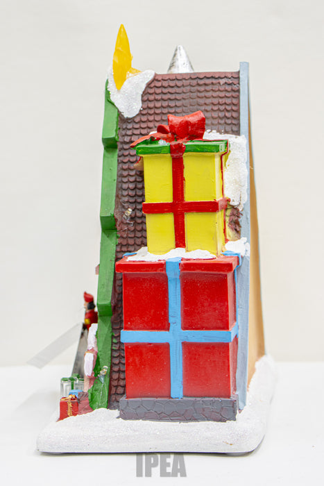 Christmas LED Village – Gift Shop (Toy Maker) – Licht, Muziek & Beweging – 25×14.5×27.5 cm